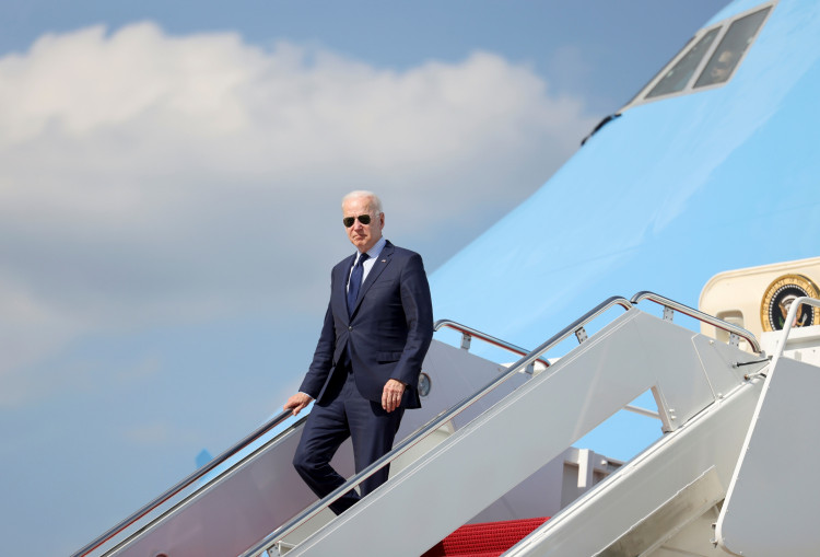 U.S. President Joe Biden disembarks from Air Force One after landing at Joint Base Andrews, Maryland.