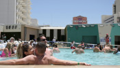 Lisa Castello and Wes Bailey relax at the pool at Circa Resort and Casino on Memorial Day in Las Vegas, Nevada, U.S., May 31, 2021. 