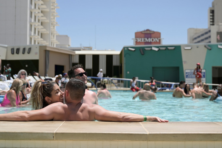 Lisa Castello and Wes Bailey relax at the pool at Circa Resort and Casino on Memorial Day in Las Vegas, Nevada, U.S., May 31, 2021. 