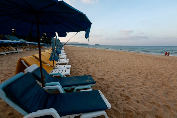 FILE PHOTO: Empty chairs are seen on a beach which is usually full of tourists, amid fear of coronavirus in Phuket, Thailand March 11, 2020. 