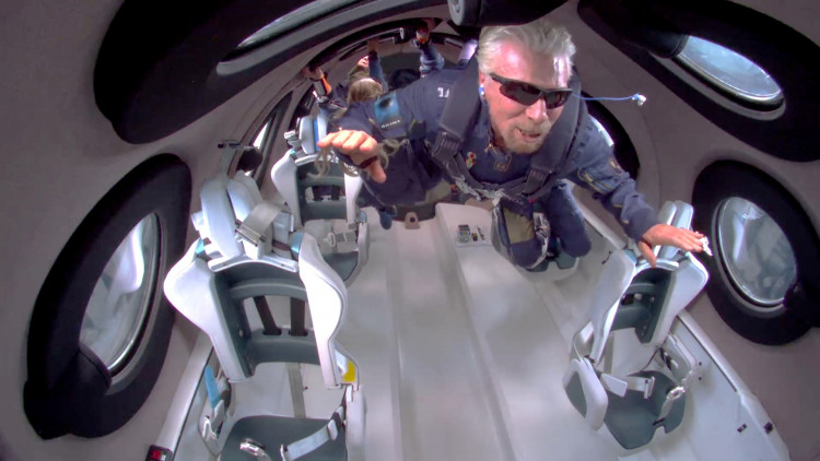Billionaire Richard Branson floats in zero gravity above Spaceport America