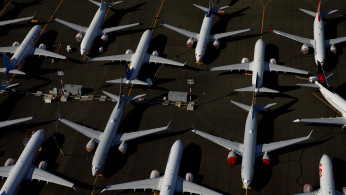 FILE PHOTO: Grounded Boeing 737 MAX aircraft are seen parked in an aerial photo at Boeing Field in Seattle, Washington, U.S. July 1, 2019. 