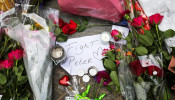Flowers and a note rest on the place where Dutch celebrity crime reporter Peter R. de Vries has been shot. 