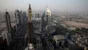 A general view of Dubai International Financial Centre (DIFC) (R) among high-rise towers in Dubai, United Arab Emirates