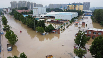 TYPHOON AFTER FLOODS
