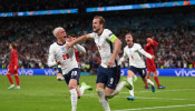 Soccer Football - Euro 2020 - Semi Final - England v Denmark - Wembley Stadium, London, Britain - July 7, 2021 England's Harry Kane celebrates scoring their second goal with Phil Foden