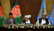 Afghan president in urgent talks as Taliban take key town near Kabul