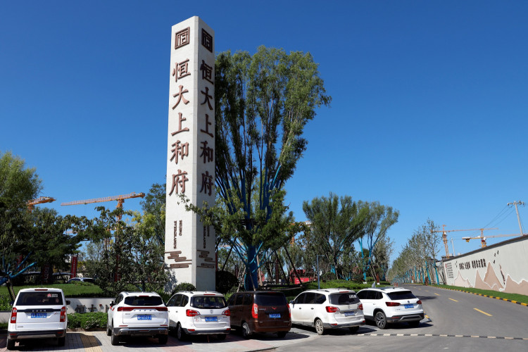 China's Evergrande chairman seeks to reassure investors, shares surge