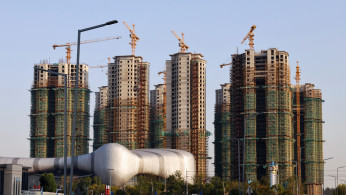 Evergrande misses payment deadline, EV unit warns of cash crunch