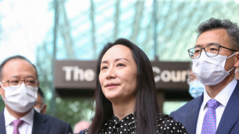 Huawei CFO leaves Canada after U.S. deal on fraud charges, detained Canadians head home