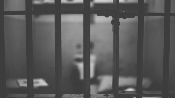 BEHIND BARS