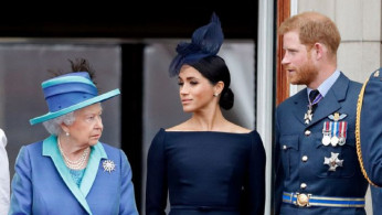Queen Elizabeth, Meghan Markle, and Prince Harry