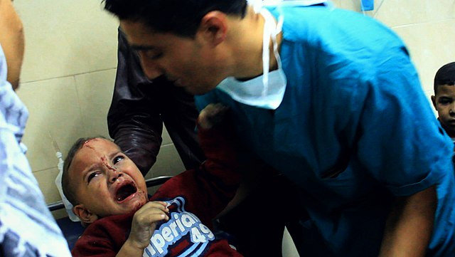 Israeli Forces Enter Gaza's Largest Hospital Amid Civilian Casualties; Hundreds of U.S. Officials Urge Biden for Ceasefire