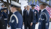 Biden Dons Trump Campaign Hat During 9/11 Commemoration, A Symbol of Unity or Political Blunder?
