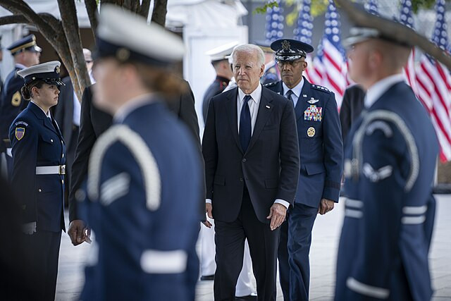 Biden Dons Trump Campaign Hat During 9/11 Commemoration, A Symbol of Unity or Political Blunder?