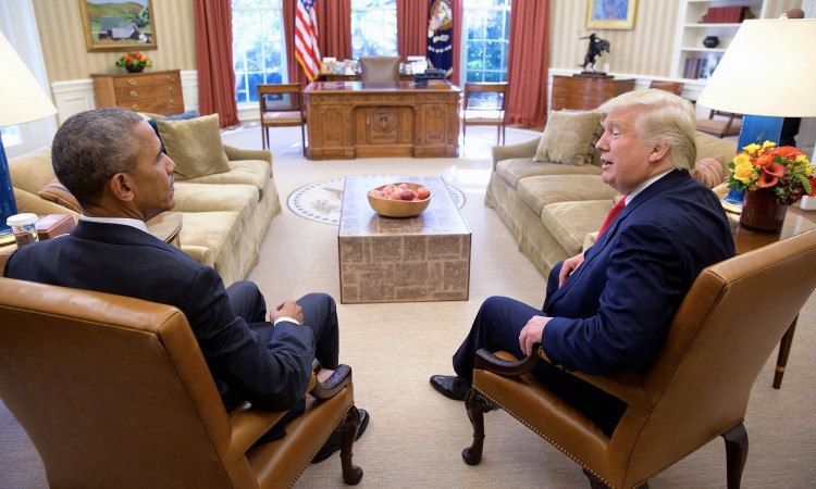 Trump and Obama share a quiet, animated conversation that prompts plenty of questions.