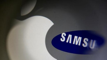 A Samsung logo and a logo of Apple