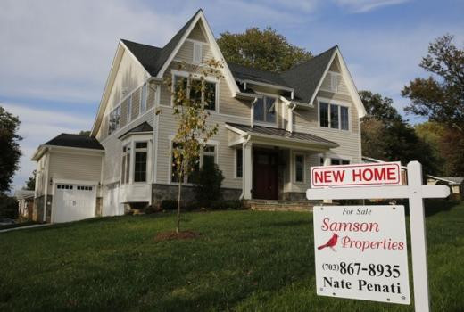 A real estate sign advertising a new home for sale