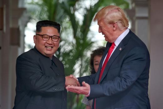 U.S. President Donald Trump and North Korea's leader Kim Jong Un shake hands