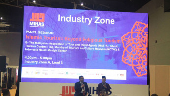 Datuk Musa Yusof(Right), senior director of International Promotion Division, Tourism Malaysia, at panel discussion about Islamic tourism during MIHAS