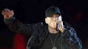 A gossip magazine reported Eminem fears the National Security is spying on him.