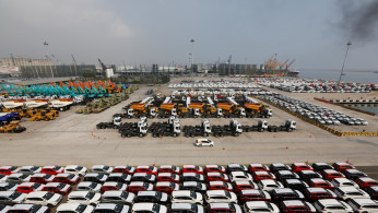 New cars wait to be loaded onto cargo ships for export at the Tanjung Priok Car Terminal in Jakarta