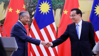 Malaysia's Prime Minister Mahathir Mohamad and China's Premier Li Keqiang