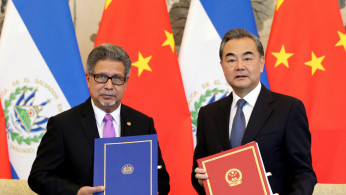 Chinese Foreign Minister Wang Yi and El Salvador's Foreign Minister Carlos Castaneda 