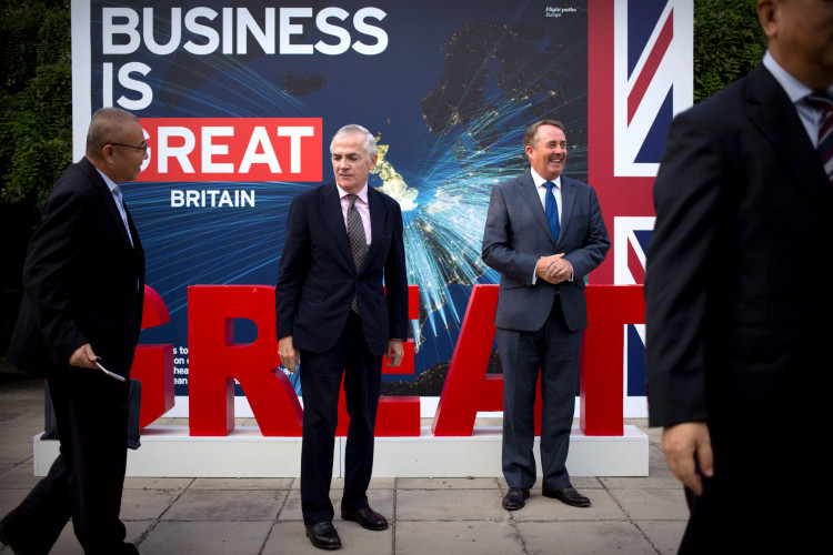Richard Burn, British Trade Commissioner for China and British Secretary of State for International Trade Liam Fox 