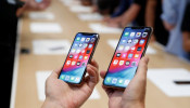 A demonstration of the newly released Apple products is seen following the product launch event in Cupertino