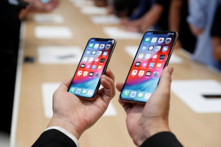 A demonstration of the newly released Apple products is seen following the product launch event in Cupertino