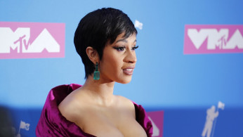 Cardi B Denies Posting Transphobic Meme Post, Says Former Team Member Did It