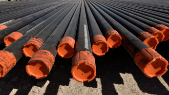 Drill pipe is seen on a drilling site in the Permian Basin oil and natural gas production area