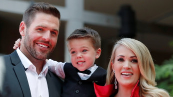 Carrie Underwood and Husband Mike Fisher Share Rare Glimpse Of Son Isaiah At Walk Of Fame Ceremony