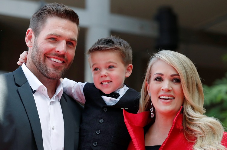 Carrie Underwood and Husband Mike Fisher Share Rare Glimpse Of Son Isaiah At Walk Of Fame Ceremony