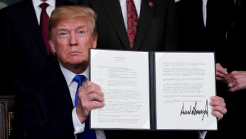 Trump announces intellectual property tariffs on goods from China, at the White House in Washington