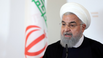 Iran's President Hassan Rouhani attends a news conference at the Chancellery in Vienna