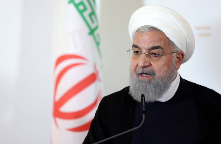 Iran's President Hassan Rouhani attends a news conference at the Chancellery in Vienna