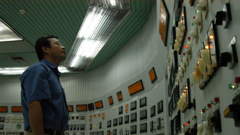 The control room of the Qinshan Nuclear Power Plant, Phase 1, China. (China, June 2004)