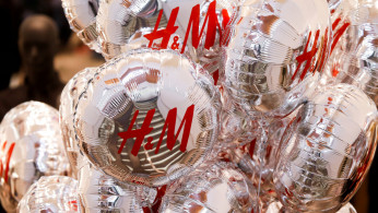 Balloons with the logo of Swedish fashion retailer H&M are pictured at its newly opened store in central Moscow