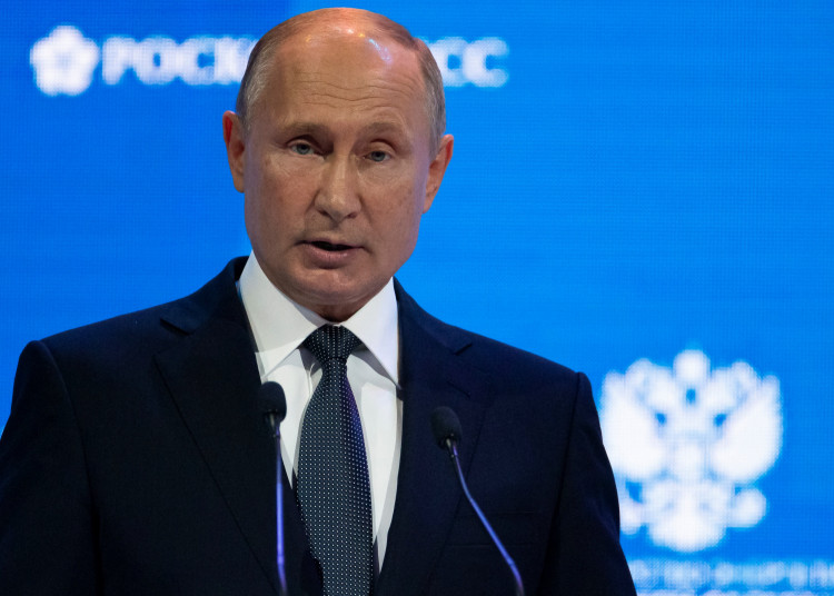  delivers a speech during a session of the Russian Energy Week international forum in Moscow, Russia October 