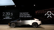 FILE PHOTO: A Faraday Future FF 91 electric car returns to the stage after an exhibition of speed during an unveiling event at CES in Las Vegas