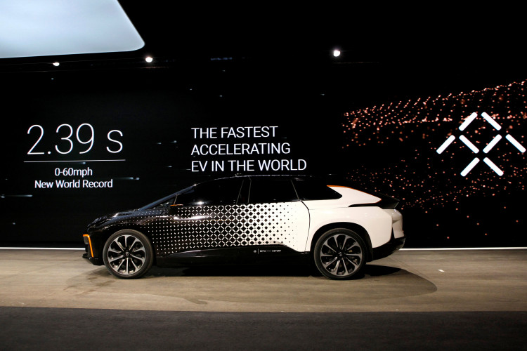 FILE PHOTO: A Faraday Future FF 91 electric car returns to the stage after an exhibition of speed during an unveiling event at CES in Las Vegas