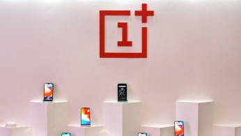 OnePlus mobile phones are seen on display during a press briefing in Mumbai