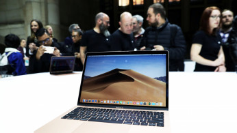 Attendees try out the new MacBook Air during an Apple launch event in the Brooklyn borough of New York