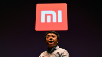 Senior vice president of Xiaomi, Xiang Wang, speaks at a UK launch event in London