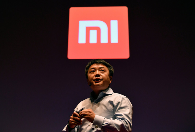 Senior vice president of Xiaomi, Xiang Wang, speaks at a UK launch event in London