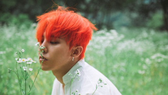 Within just nine months in the military, a couple of the Big Bang member's photos emerge online and he looks a little different. 