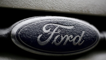 Snowflakes are seen on the badge of a Ford car in Warsaw