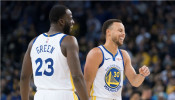 Golden State Warriors forward Draymond Green (23) and guard Stephen Curry (30)